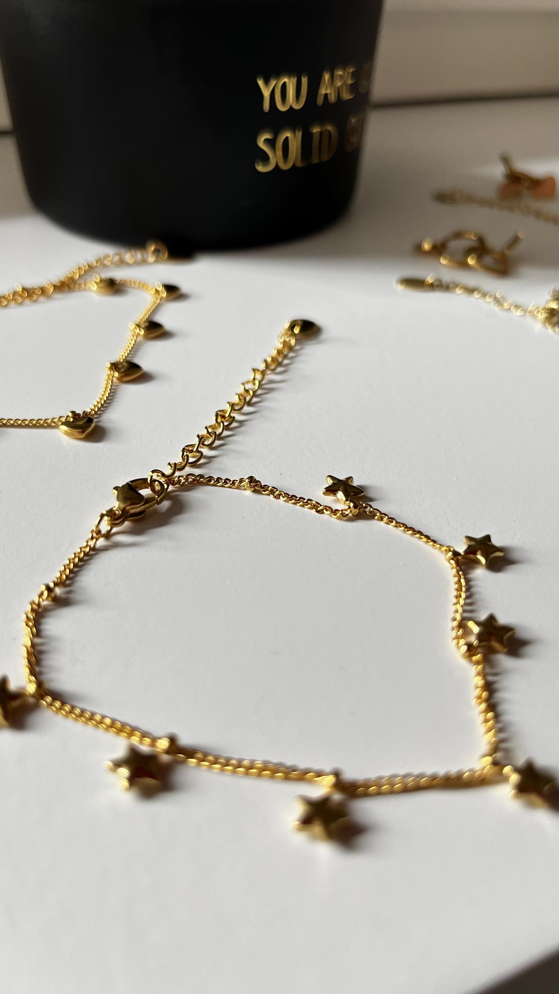 Armbandje met mini STERREN β goudkleurig RVS